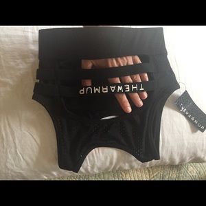 Sports top with pads